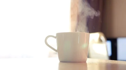A cup of tea or coffee, with steam. HD, 1920x1080, slow motion Stock Footage 123297798