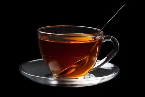 Cup of tea over black background Stock Photos