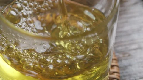 A cup of tea - pour, flow, splash close up Video stock 234498955