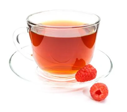Cup of tea with raspberry isolated Stock Photos