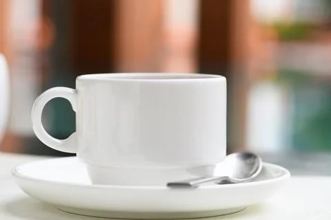 A cup of tea with a spoon Stock Photos
