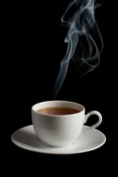 Cup of tea with steam Stock Photos