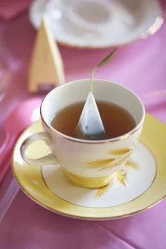 A Cup of Tea Steeping with a Triangular Tea Bag 스톡 사진