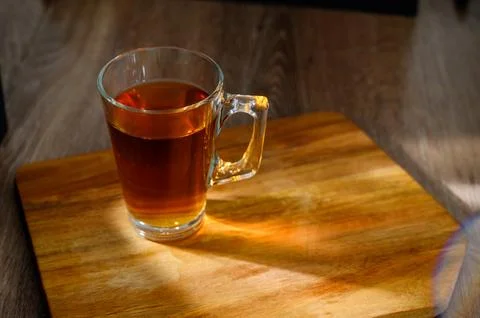 A cup of tea on a table. glass Stock Photos