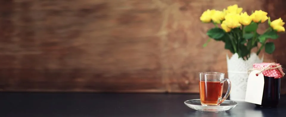 A cup with tea on the table Stock Photos