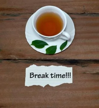 A Cup Of Tea With Text Break Time On Wood Background.Concept Photo Stock Photos