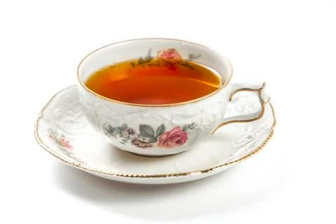 Cup of tea on a white background, closeup side view Stock Photos