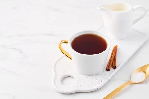 Cup of tea on white marble table top. 스톡 사진