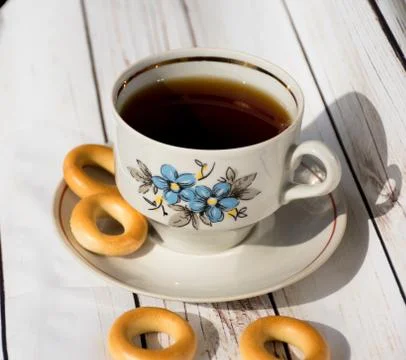 Cup of tea on wooden table Stock Photos