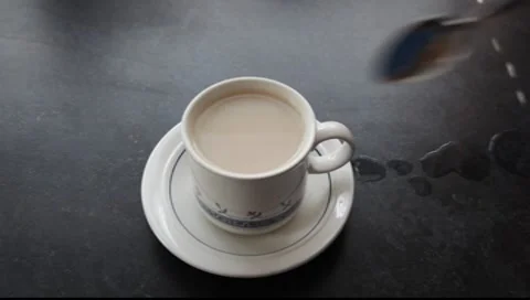 Cup with a teabag being stirred. Stock-Footage 8514226
