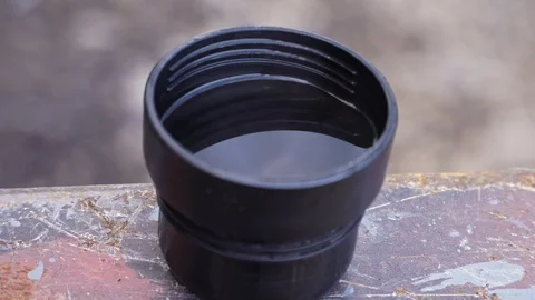 Cup from a thermos with tea Stock Footage 104262588