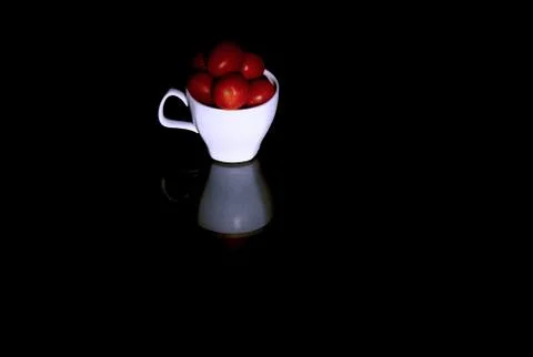 A cup of tomatoes Stock Photos