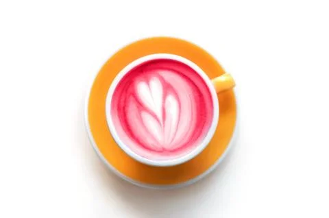 Cup of trendy beetroot latte on table. Foto stock