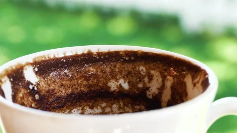 Cup of Turkish coffee with grounds for fortune telling from the shapes Stock Footage 155281324