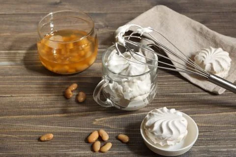 Cup with whipped aquafaba, for making marshmallows and meringues. jar with Stock Photos