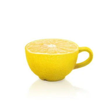 Cup on a white background. Cup with a texture of lemon. Creative. Abstract Stock Photos