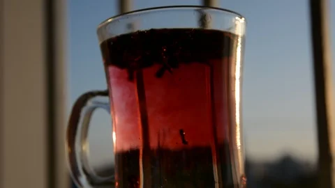 Cup on window sill with lockable tea Stock-Footage 124747758