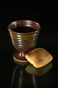 Cup of Wine and Bread on Table Stock Photos