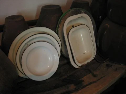 Cupboard with pots Stock Photos