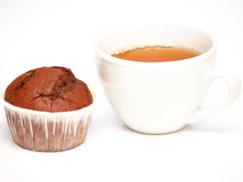 Cupcake and tea Stock Photos