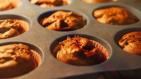 Cupcake. Baking in oven. Time lapse footage of cooking muffins. 4k, UHD Stock Footage