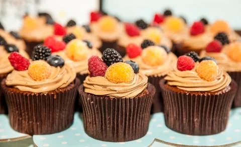 Cupcake with berries Stock Photos