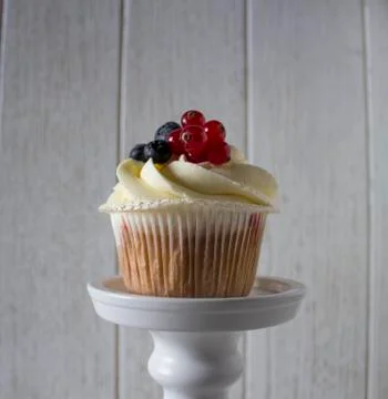 Cupcake with berries Stock Photos