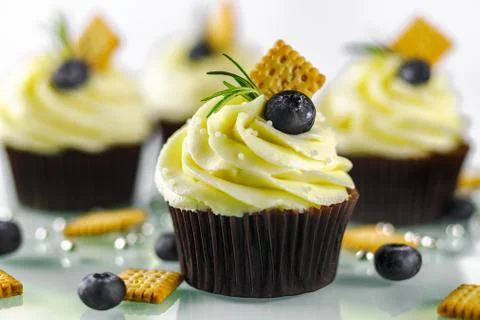 Cupcake with biscuits Stock Photos