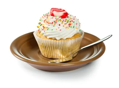 Cupcake on brown plate Stock Photos