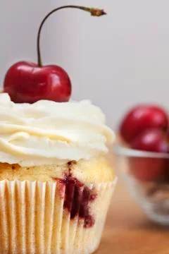 Cupcake with cherries Stock Photos