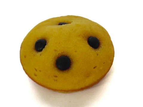 Cupcake with choco chips isolated on a white background 스톡 사진