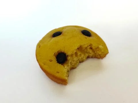 Cupcake with choco chips isolated on a white background Foto stock