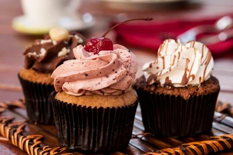 Cupcake with coffee Stock Photos