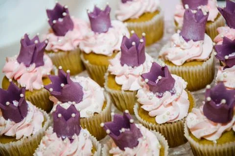 Cupcake with crown Stock Photos