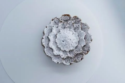 Cupcake dusted with icing sugar Stock Photos