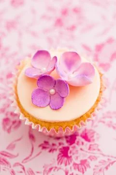 Cupcake with flowers Stock Photos