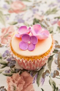 Cupcake with flowers Stock Photos