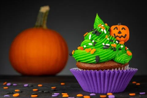 Cupcake on Halloween. Pumpkin Jack o lantern Stock Photos