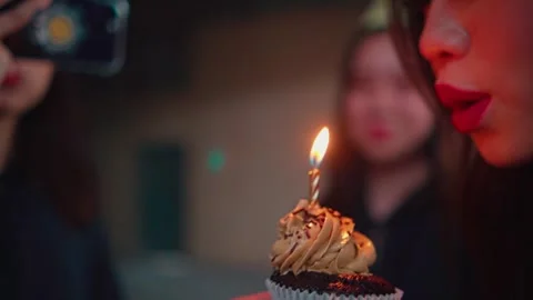 Cupcake with Lit Candle at Celebration Stock Footage 283535566