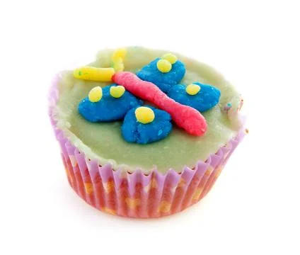Cupcake with marzipan decoration Stock Photos