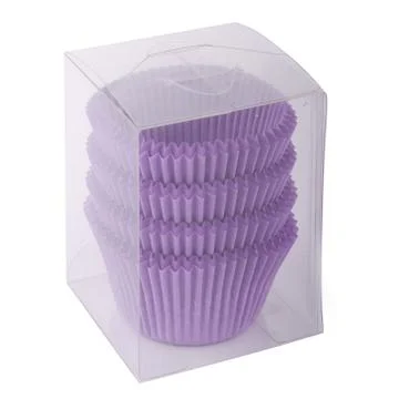 Cupcake paper forms in a plastic packaging isolated over white background Stock Photos