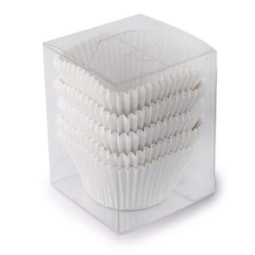 Cupcake paper forms in a plastic packaging isolated over white background Stock Photos