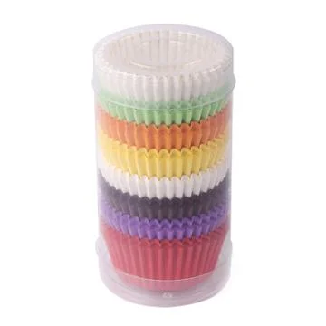 Cupcake paper forms in a plastic packaging isolated over white background Stock Photos