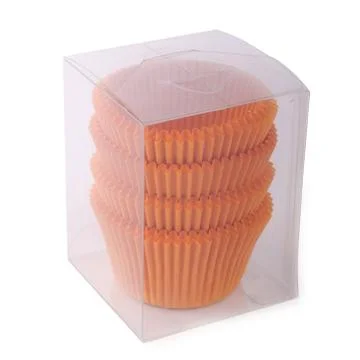 Cupcake paper forms in a plastic packaging isolated over white background Stock Photos