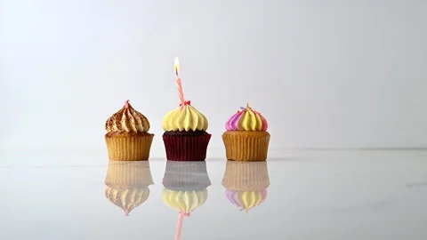 Cupcake party with candle Stock Footage