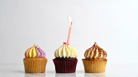 Cupcake party with candle Stock Footage 112107520