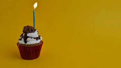 Cupcake party with candle Stock Footage 112107686