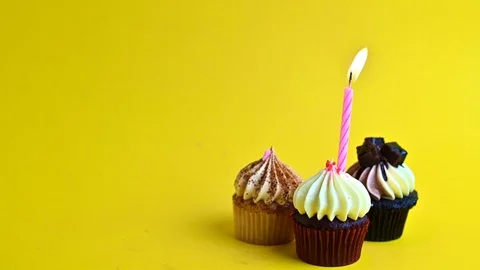 Cupcake party with candle Stock Footage 112107745