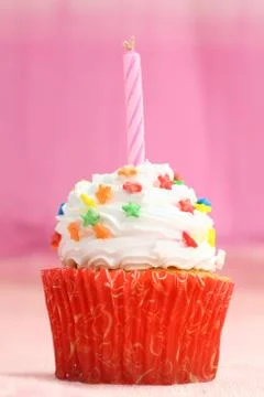 Cupcake in pink background Stock Photos