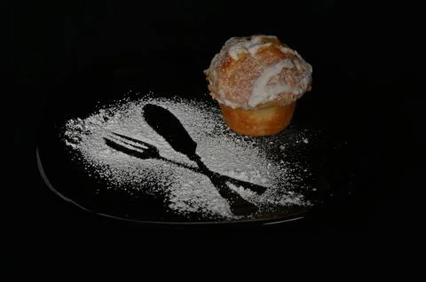 Cupcake powdered with sugar Stock Photos